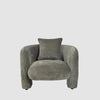 Ella armchair in green upholstery with elegant minimalist silhouette for home interiors