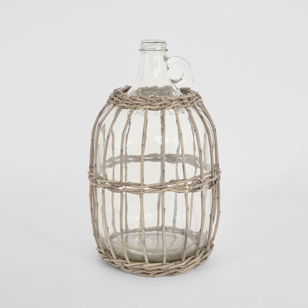 Rustic willow and glass lantern for candles and cozy home decor styling