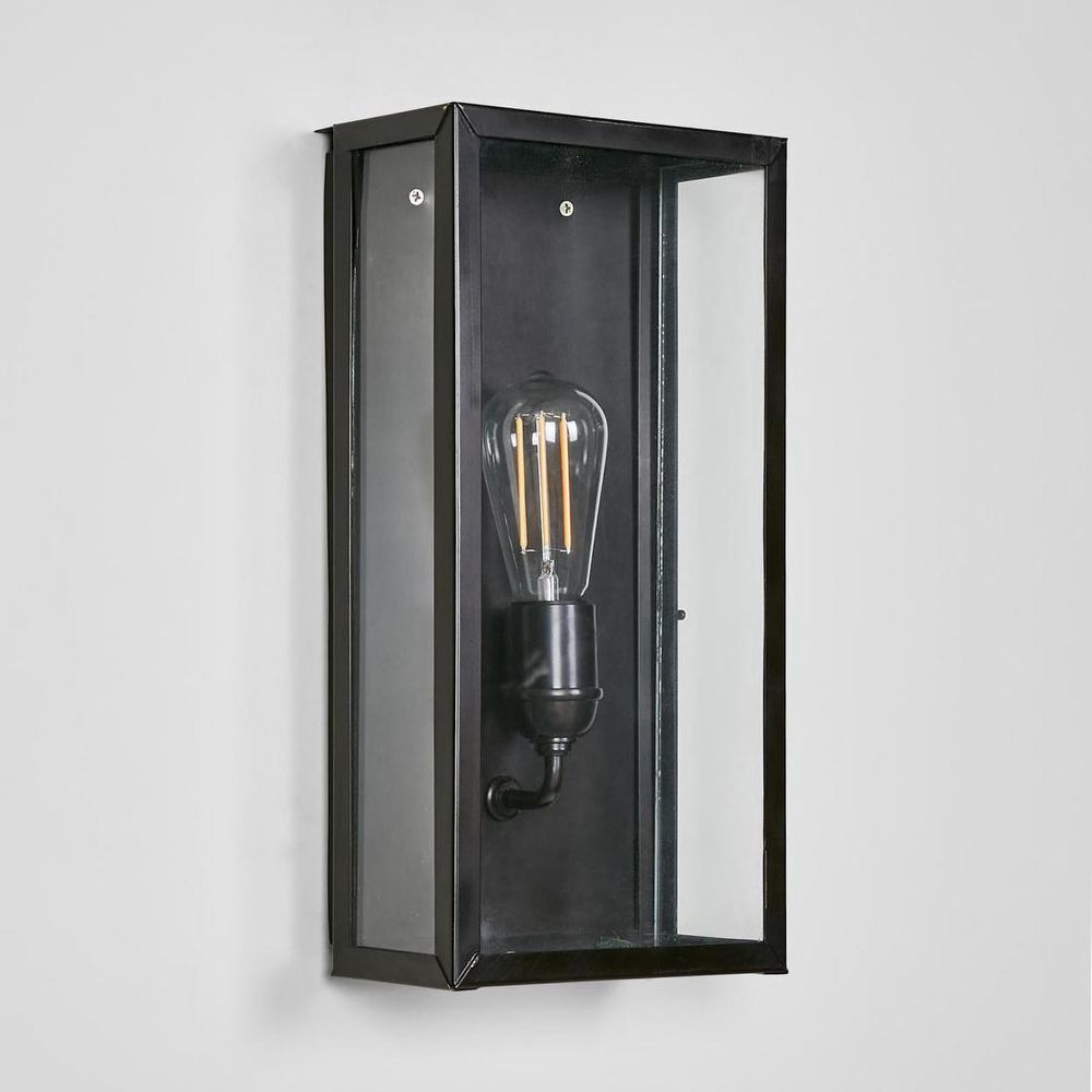 Goodman Outdoor Wall Light in black, silver, or brass with clear glass – classic Hampton-style outdoor wall sconce for entryways, patios, and walkways