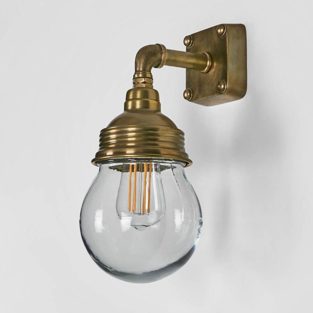 Dover Wall Light IP54 solid brass with clear glass ball shade – modern outdoor wall sconce for patios, entryways, and bathrooms