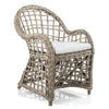 Mauritius wicker armchair with rattan frame, roll arm design, and removable cushion in coastal Hamptons style