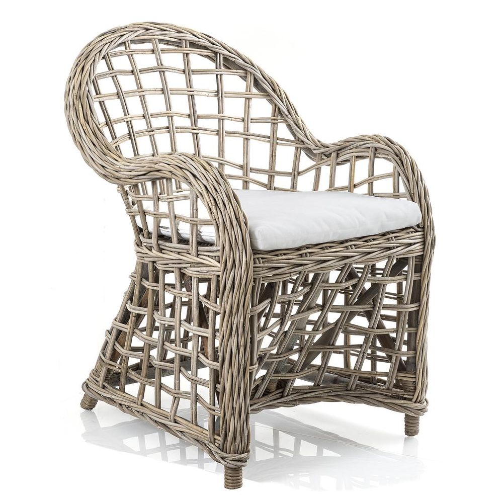 Mauritius wicker armchair with rattan frame, roll arm design, and removable cushion in coastal Hamptons style