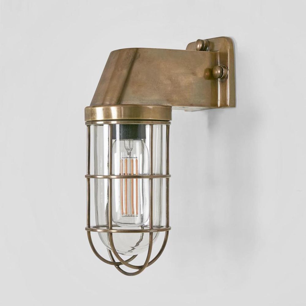 Royal London Wall Light IP54 solid brass with clear glass and brass cage – industrial outdoor wall sconce for patios, entryways, and bathrooms