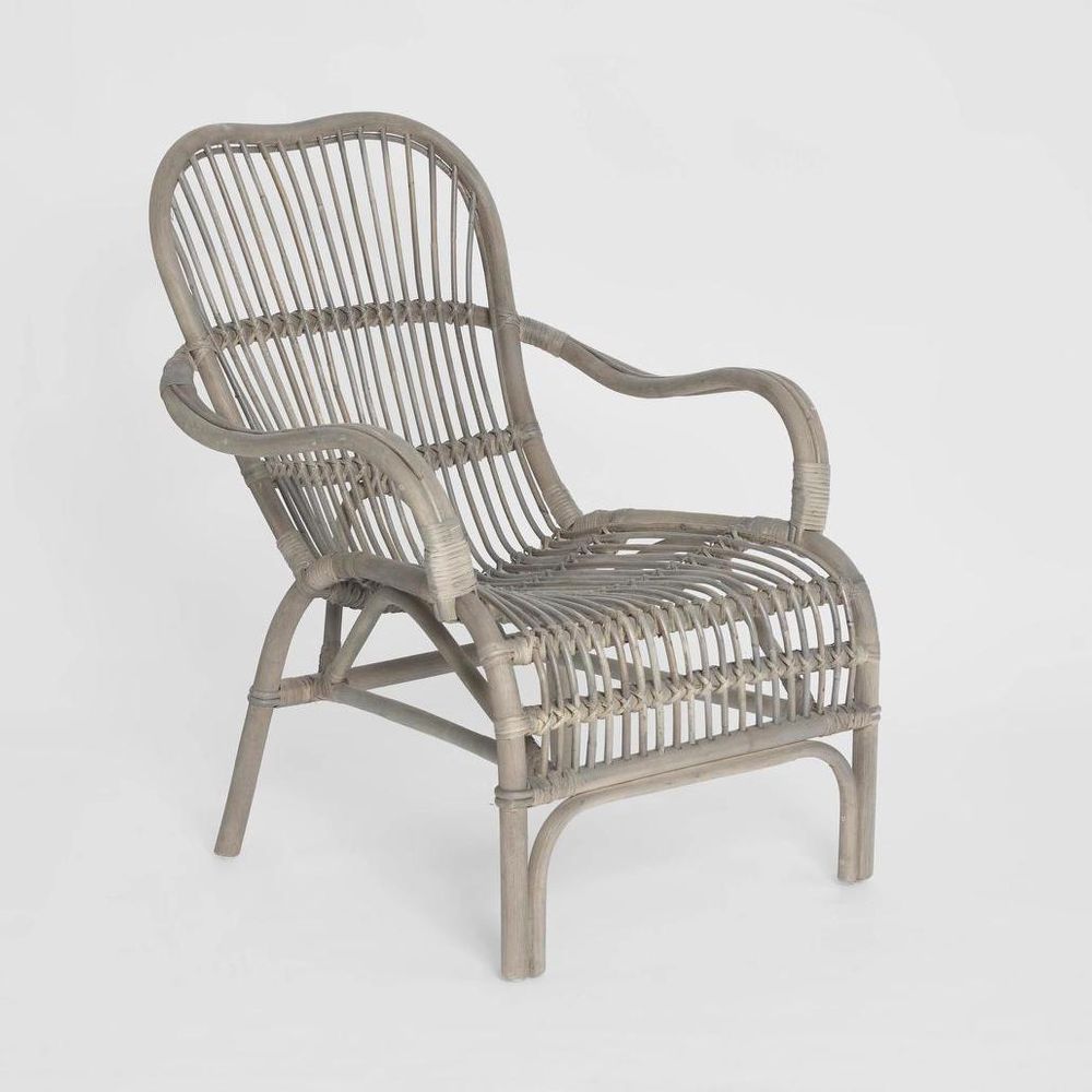 Seville hand woven rattan armchair with high backrest, curved silhouette, and natural finish for indoor seating