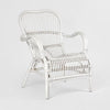 Handcrafted woven armchair with natural texture and refined finish