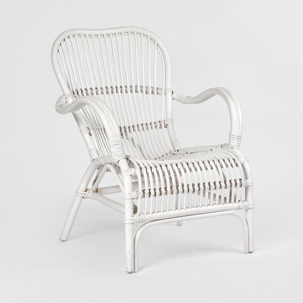 Handcrafted woven armchair with natural texture and refined finish