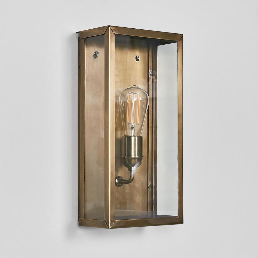 Goodman Outdoor Wall Light in black, silver, or brass with clear glass – classic Hampton-style outdoor wall sconce for entryways, walkways, and patios