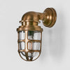 Porto Wall Light IP54 solid brass with clear glass and metal cage – industrial outdoor wall sconce for patios, entryways, and bathrooms