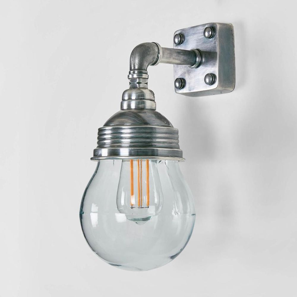 Dover Wall Light IP54 solid brass with clear glass globe – modern outdoor wall sconce for patios, entryways, and bathrooms