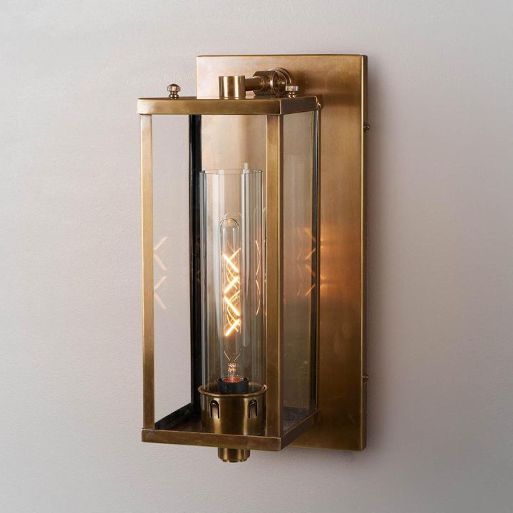 Pavillion Outdoor Wall Light in silver or brass with clear glass – classic Hampton-style outdoor wall sconce for entryways, patios, and walkways
