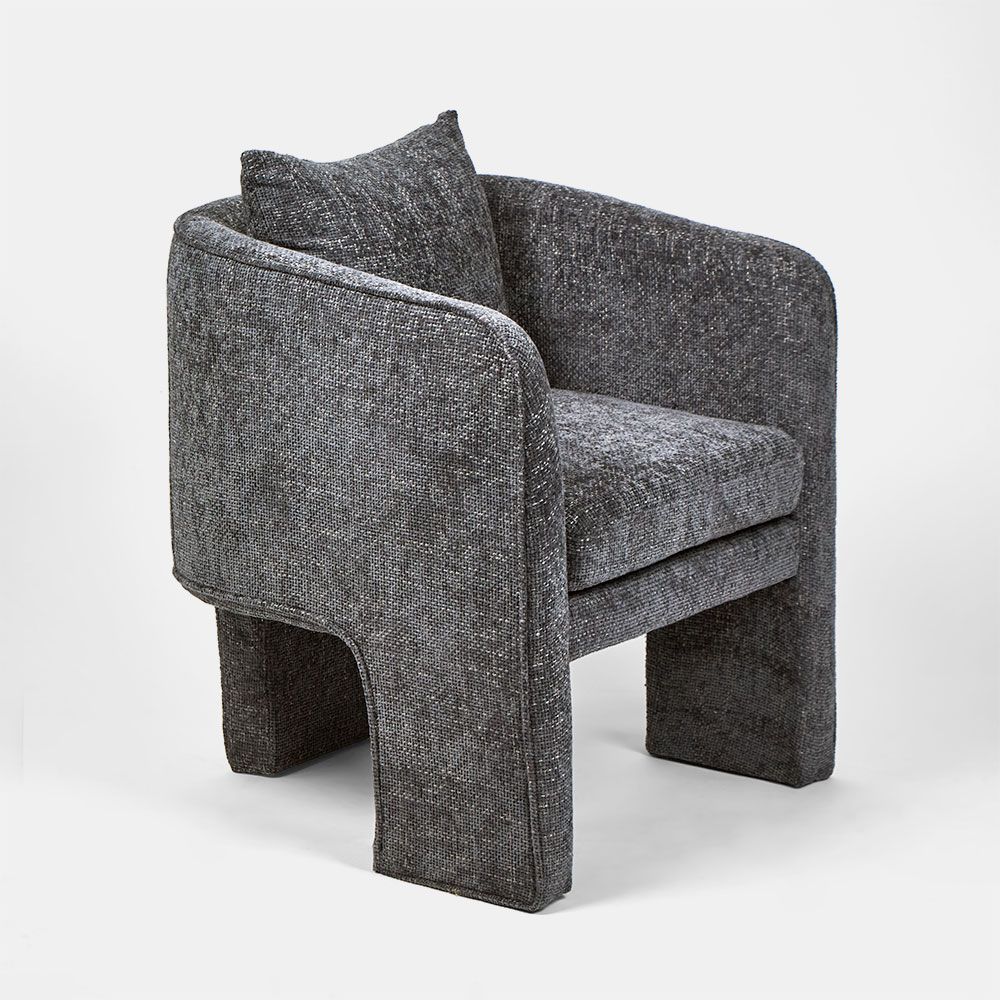 Kennedy midnight blue armchair with tailored upholstery, three leg base, and modern contemporary design