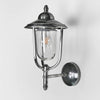 Pier Wall Light in antique brass with clear glass and cage – IP54 rated vintage outdoor lantern wall sconce for patios, entryways, and bathrooms